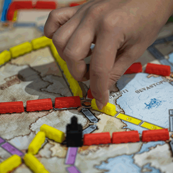 Person playing a board game