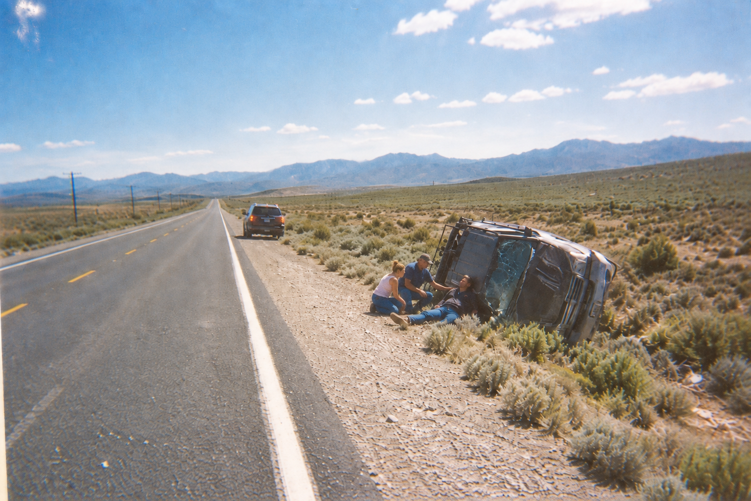 Passersby help rollover victim on remote road